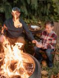 Father and son making smores
